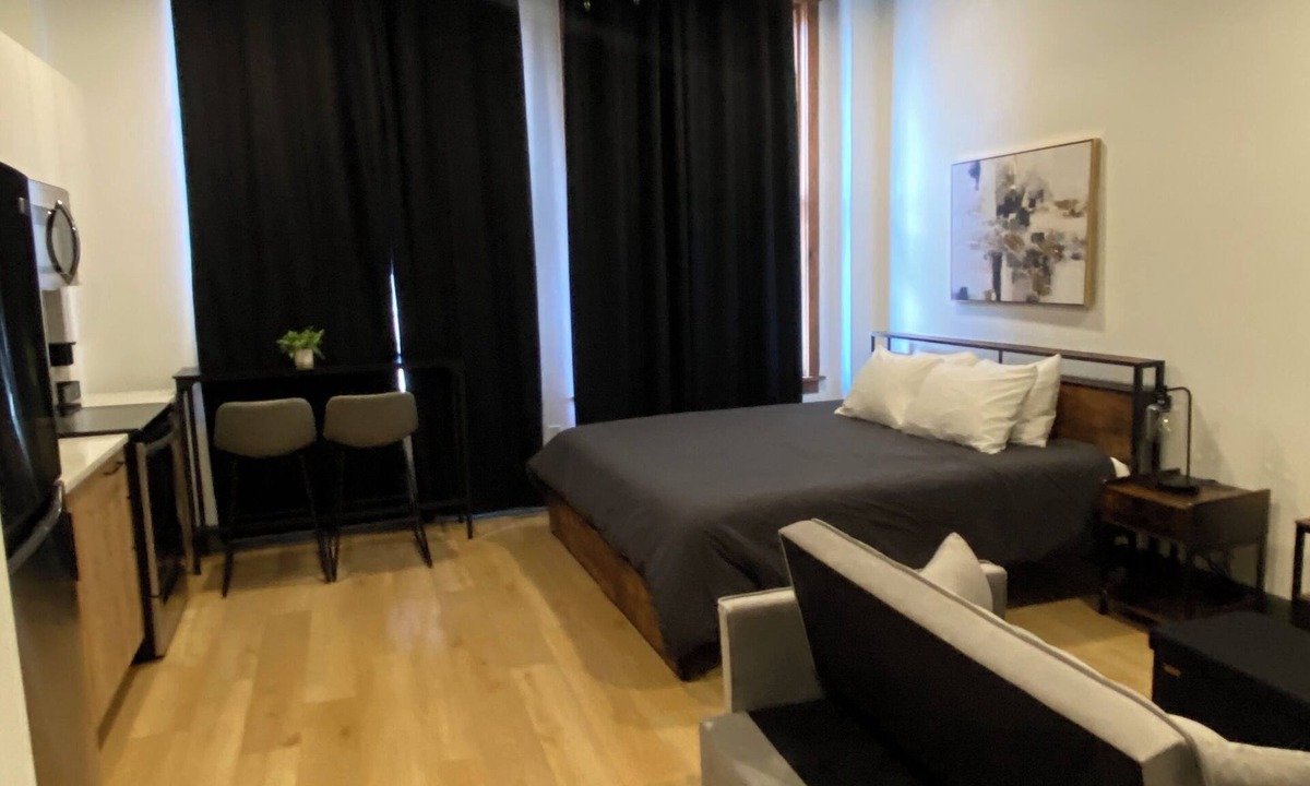 Central City Apartment | Optimum - Downtown Oasis!