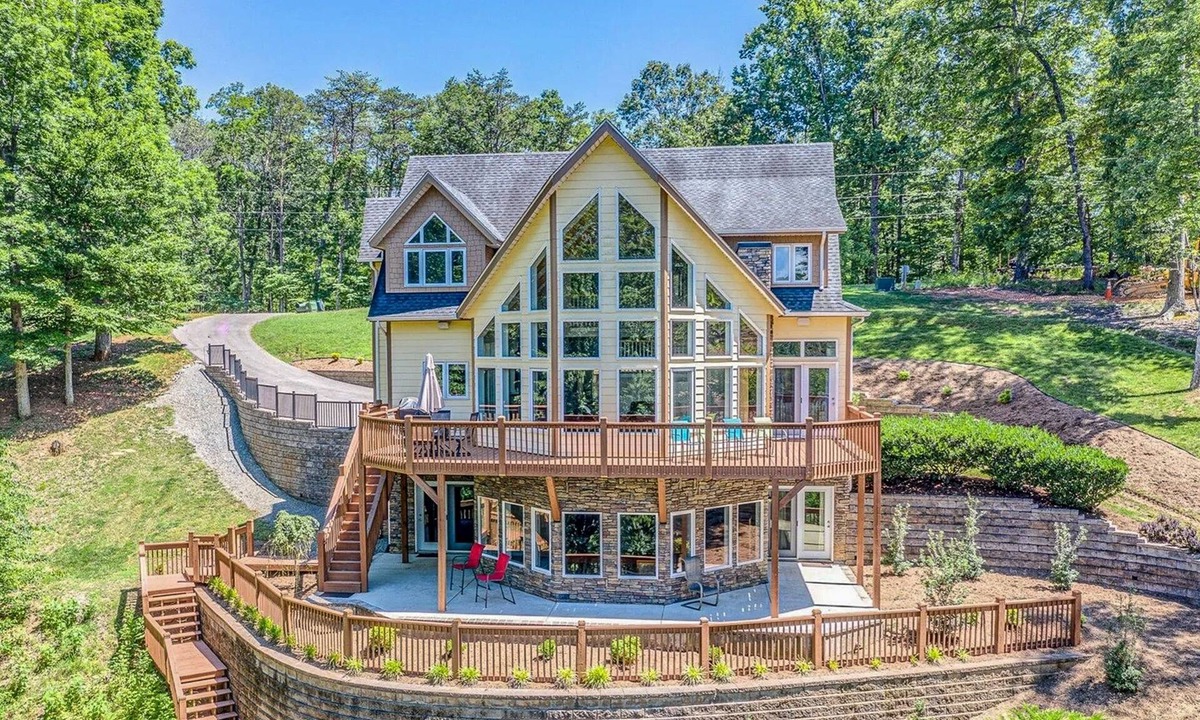 Moneta House | Osprey Cove - Custom Lakefront home with 2-story dock, Wifi, Game Room and Fireplace