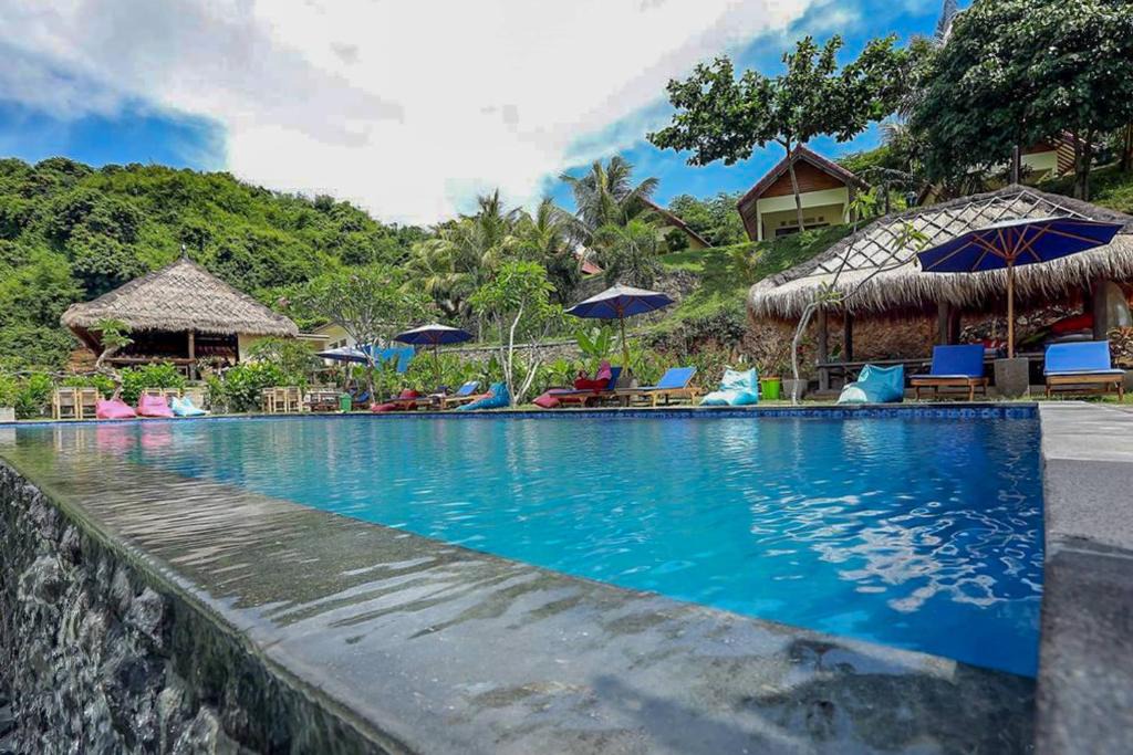 Selong Belanak Hotel | OYO 2823 Artati Bungalows And Restaurant
