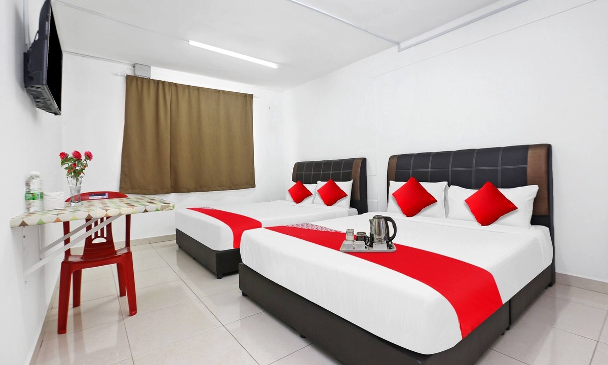 Gua Hotel | OYO 90873 Travellers Inn
