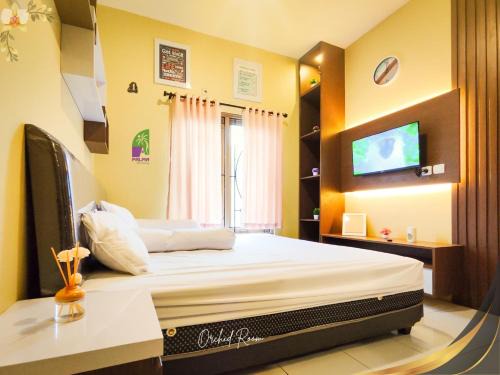 Klaten Selatan House | Palma Orchid Room Klaten I Cozy room in central Klaten