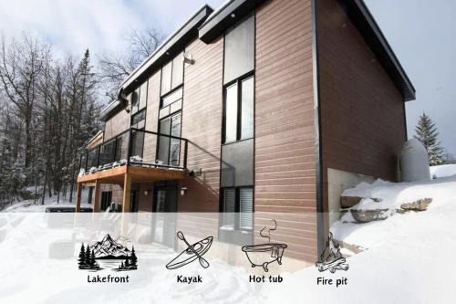 Chertsey House | Panoramic Lakefront Chalet with Hot Tub & Firepit