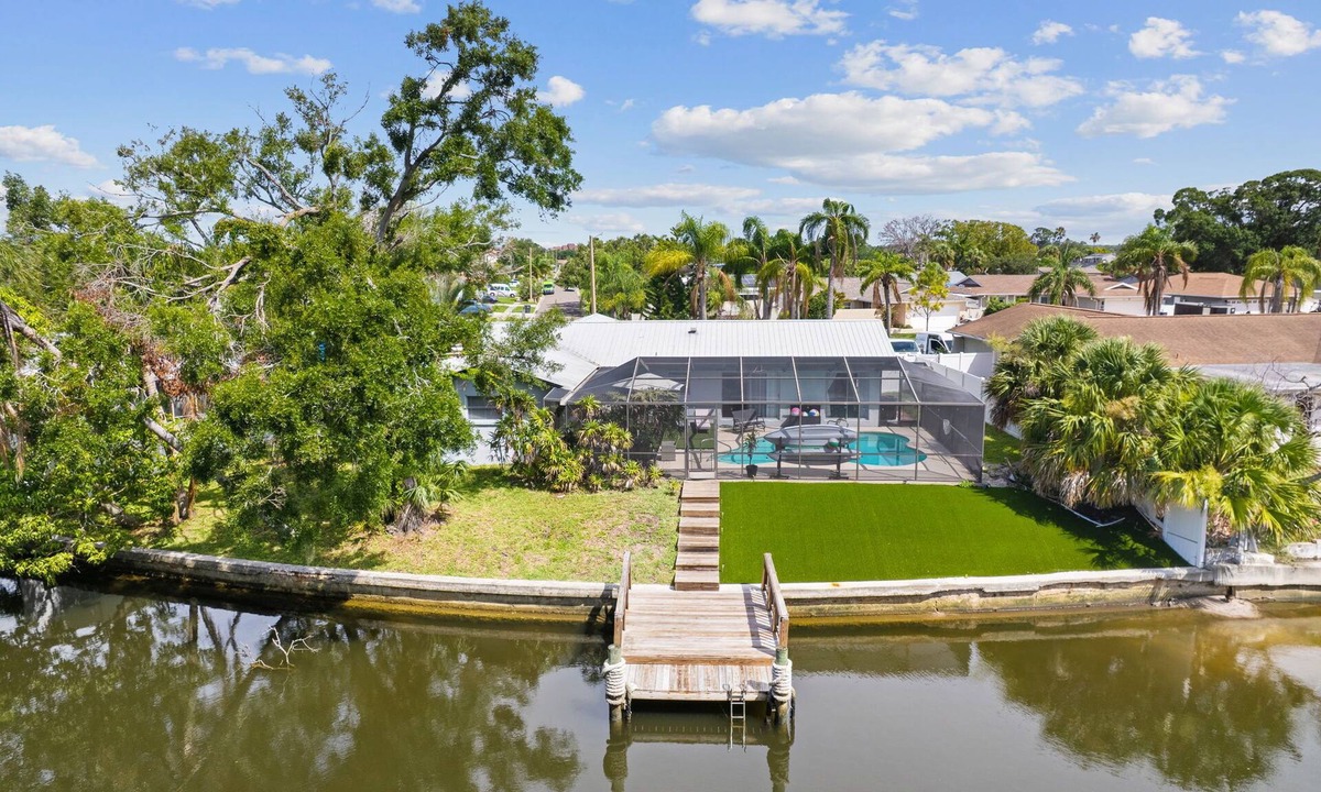 Tampa House | Paradise Pool Home with Canal Access