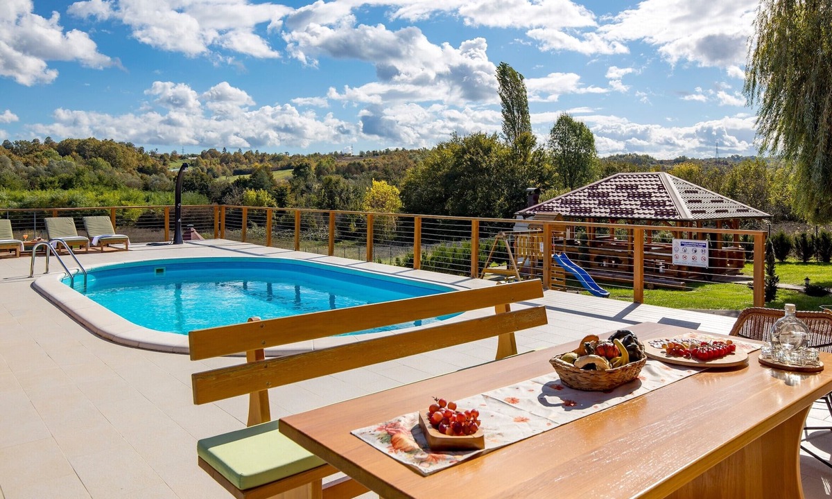 Petrinja House | Peaceful countryside retreat with pool, jacuzzi, sauna, tennis, and river views.