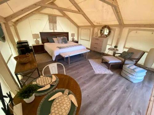 Bastrop House | Peaceful Lakefront Safari Tent with Fire Pit and Lake Views near Austin, Texas