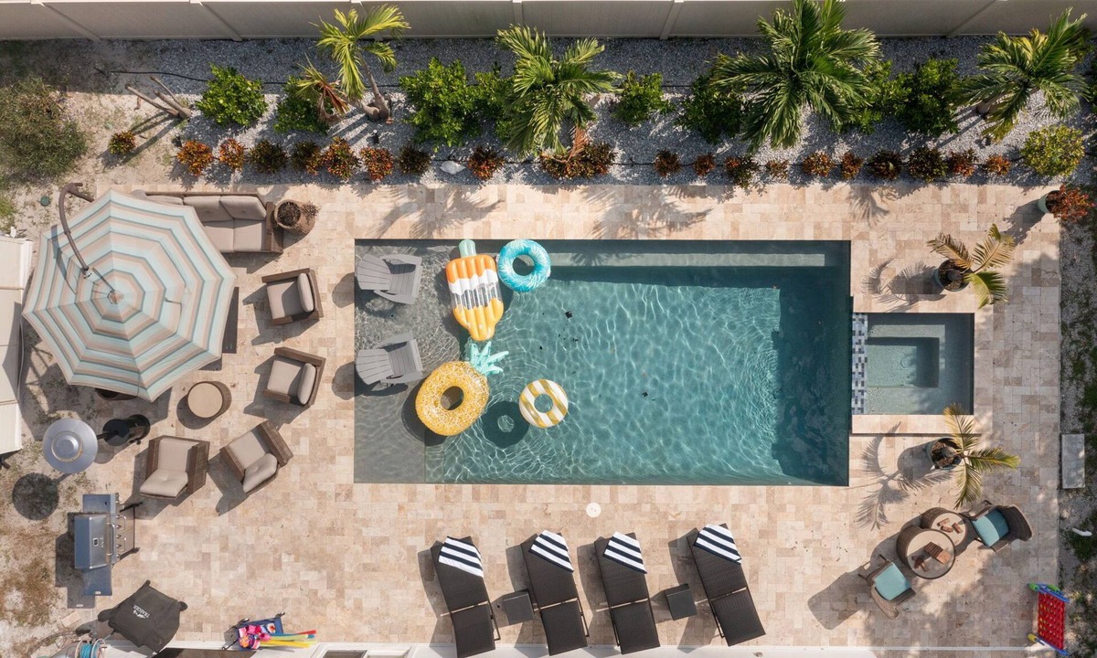 Disston Heights House | Poolside Palm Hideaway - Saltwater Pool, Hot tub, Games & FUN!