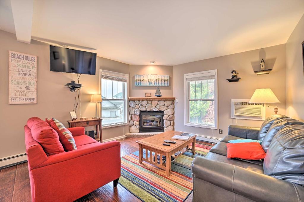 Onekama Apartment | Portage Lake Condo with Deck and Pool Access!