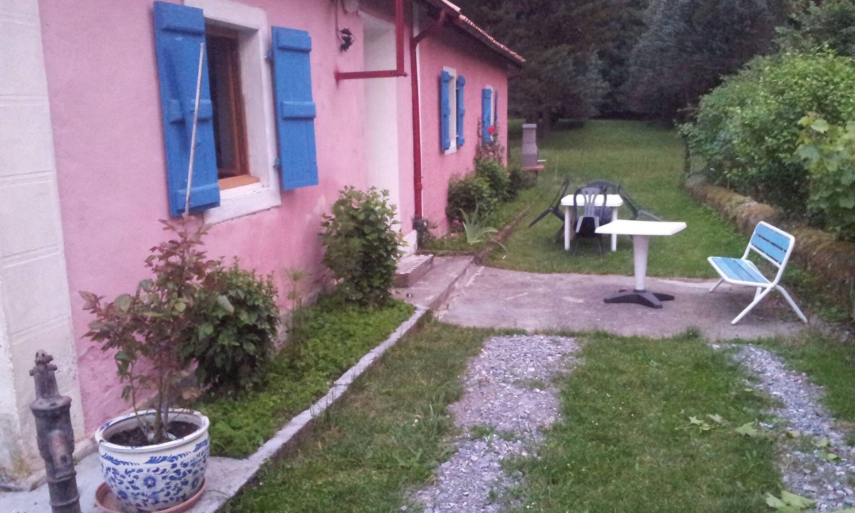 Ore House | Pretty pink house with blue shutters