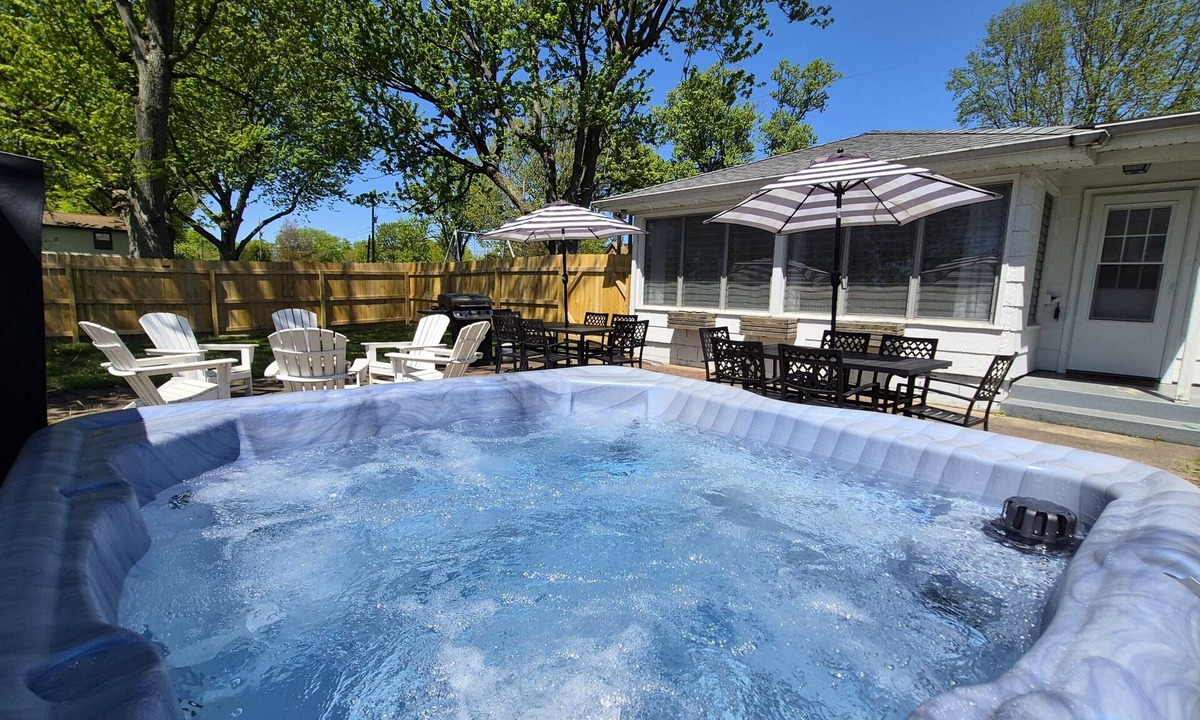Three Oaks House | Price Improvement Large fenced yard fire pit hot tub game room