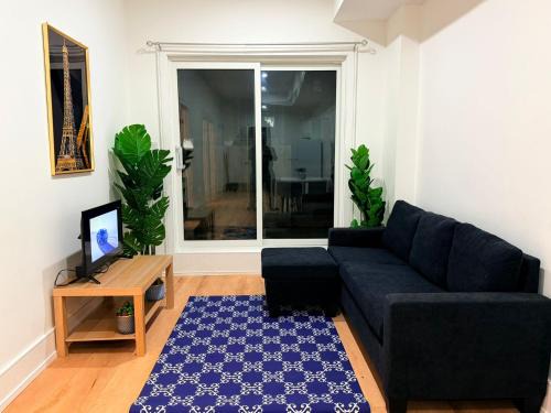 Oakridge Apartment | Private 2-Bedroom Basement Suite with Patio, Free Parking & Laundry