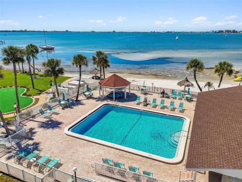 Bayview House | Private Beach Access 2 Pools Waterfront Oasis