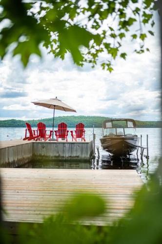 Madawaska Valley Ski Chalet | Private Cliffside Chalet Nestled in Nature With Western Sunsets & Waterfront Access Near Algonquin Park