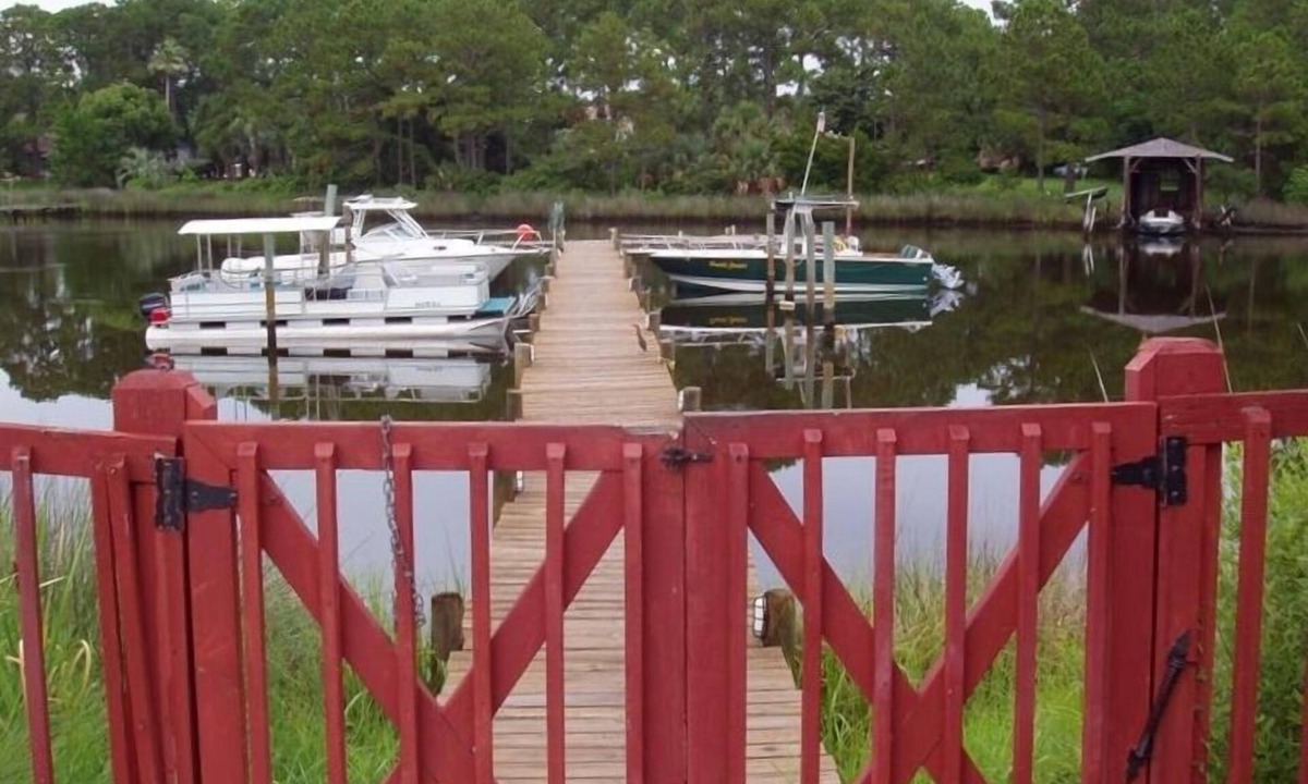 Thomas Drive Condo | Private Dock - Ground Floor - Poolside - Walk to the Beach