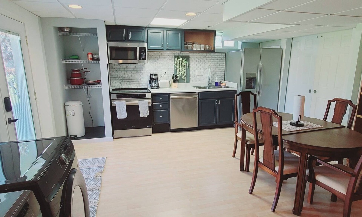 Wentzville House | Private walkout basement: 2 queen beds & full bath