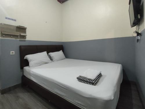 South Tangerang Hotel | Puspiptek Residence Syariah Mitra RedDoorz