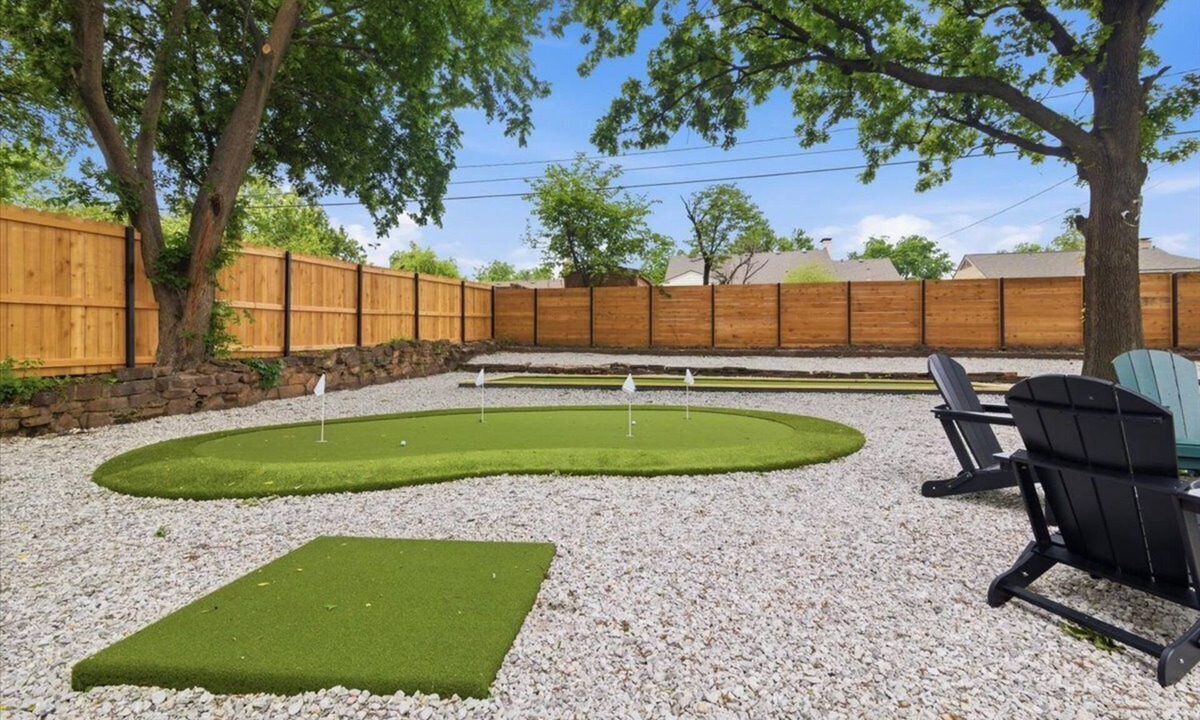 Cherry Street House | Putting Green Bocce Court Firepit in Tulsa