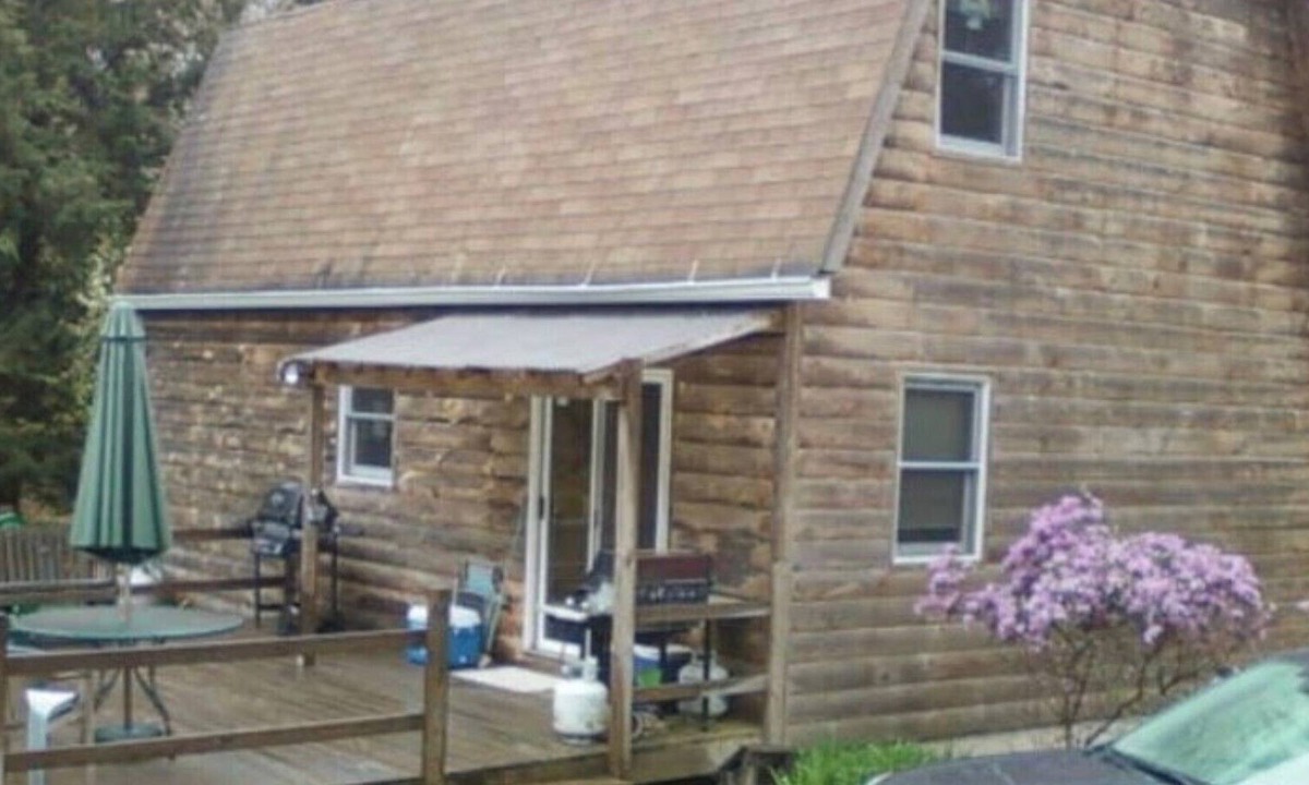 East Branch House | Quaint Log-Face Home to Escape Reality