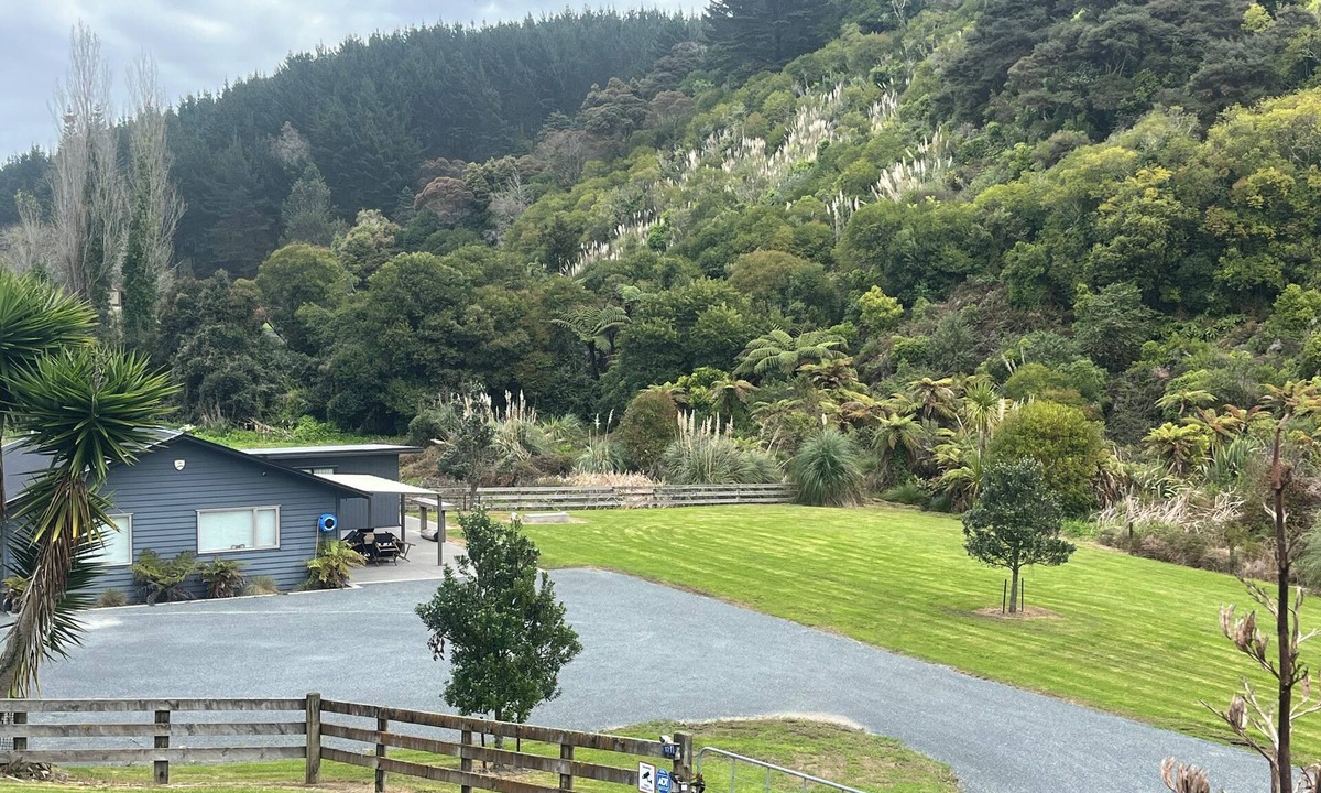 Kawhia House | Quiet private bush out look but right in town. Perfect for boaties