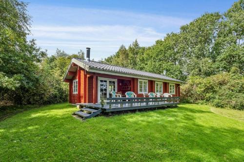 Vester Grønning House | Red Timber House With Fjord View