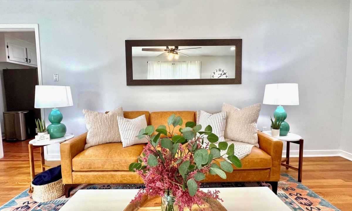 North Chesterfield Cottage | Relax at Crieff Cottage, a cozy 3-bedroom Richmond retreat with a private hot tub, two king bedrooms, inviting living spaces, and a stocked kitchen. Quiet location with easy access to downtown, restaurants, hospitals, and universities.