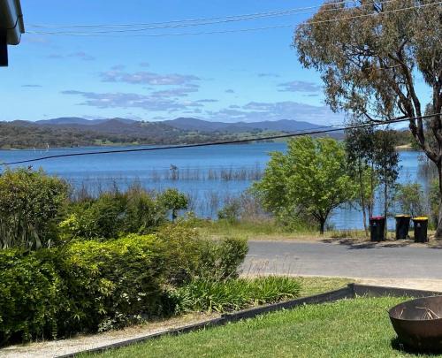 Goughs Bay House | Relax in the spa with views opposite Lake Eildon