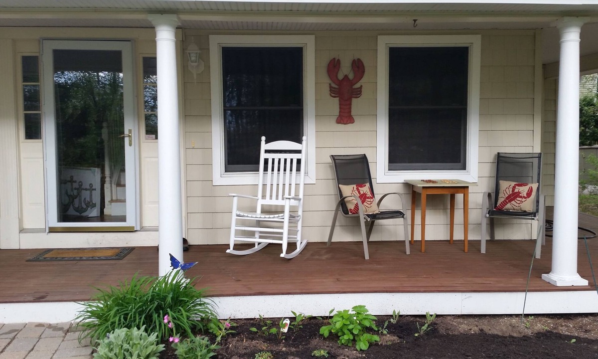Saunderstown House | Relax on front rockers or private back yard/covered deck. Easy access Route 1A.