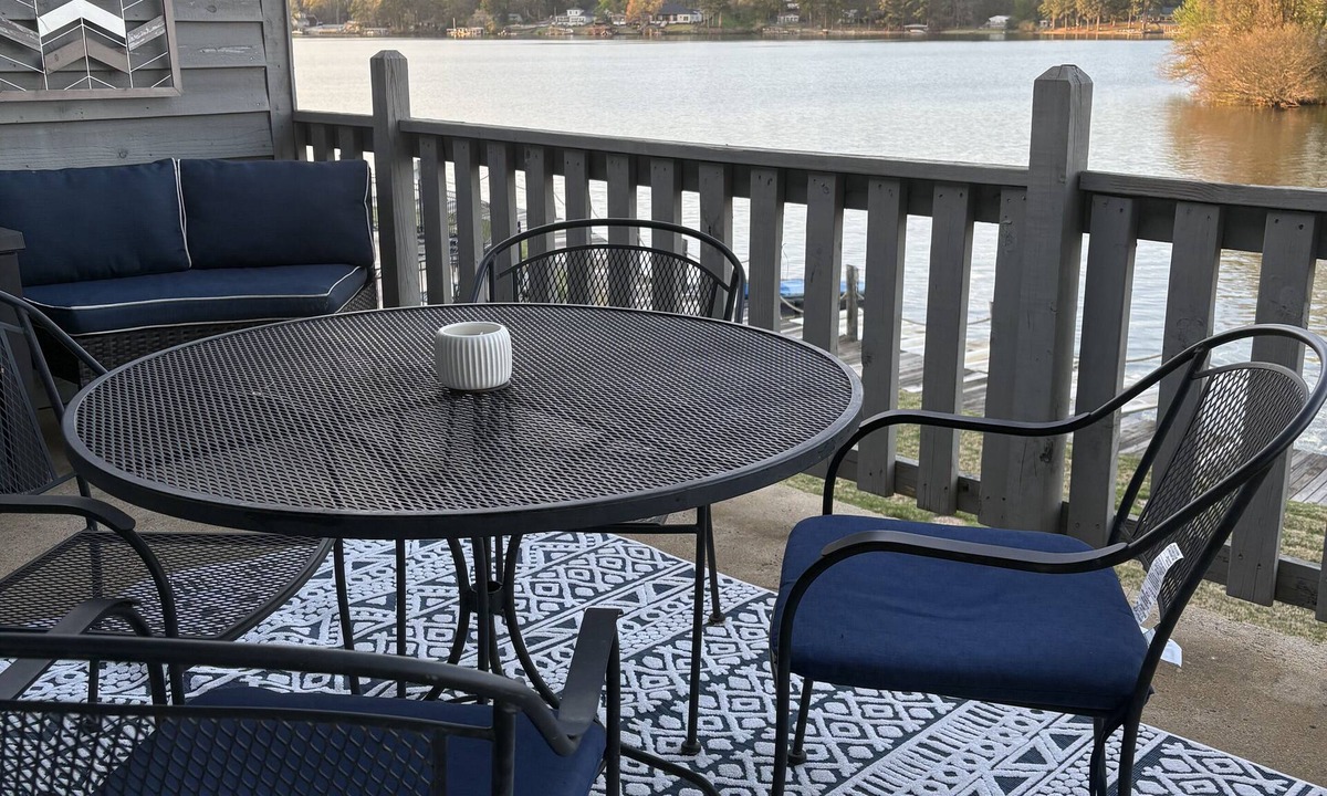 Hot Springs Condo | Relax on private balcony with a stunning view of Lake Hamilton.