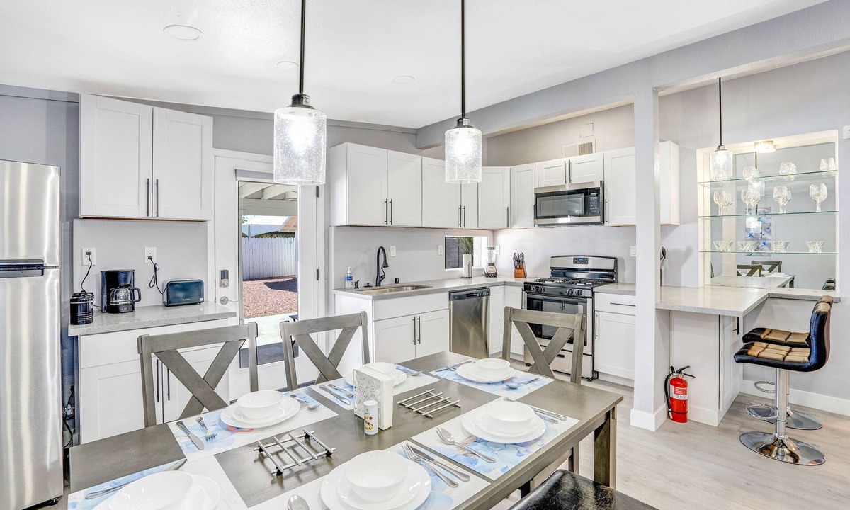 North Las Vegas House | Remodeled Home with Lush Landscapes, King Beds, BBQ, Games, Workspace and More!