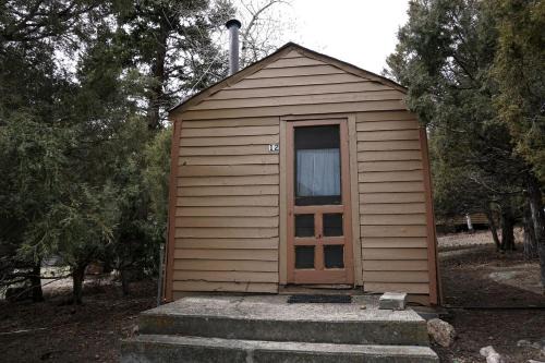 Bellvue House | Remote and Cozy Mountain Cabin Nestled in the Poudre Canyon, Perfect for a Pet Friendly Glamping Retreat