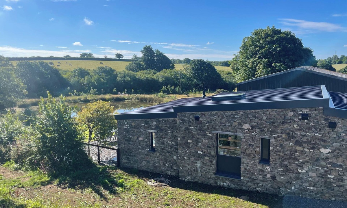 Milford Haven House | Renovated Barn with Pond View