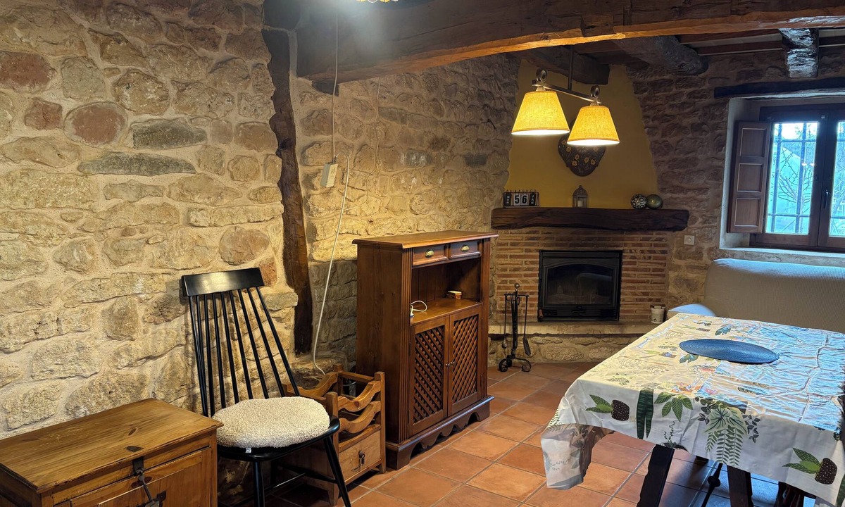 Sedano House | Renovated house with 2 bedrooms, 1 bathroom and living-dining room in stone and wood is very cozy.
