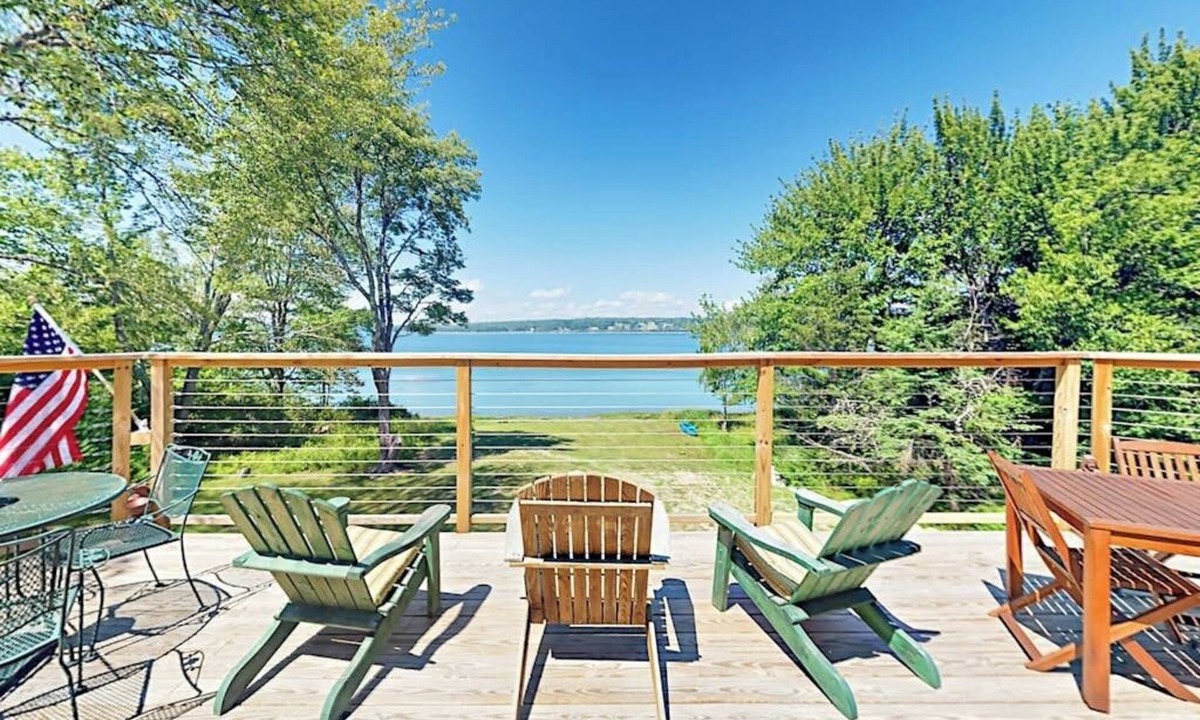 Lamoine Beach Cabin | Renovated waterfront cottage with expansive deck, multiple fireplaces, & grill