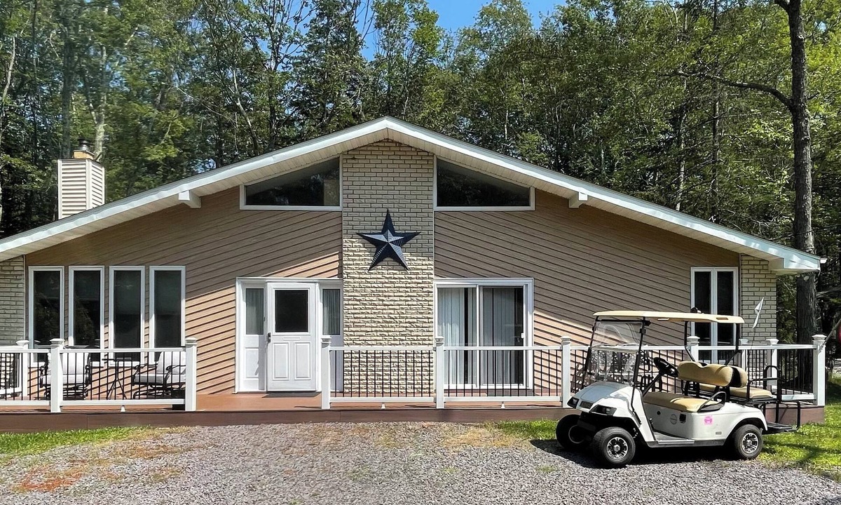 Locust Lake Village House | Rent this Pet Friendly Single Home backing up to open space.