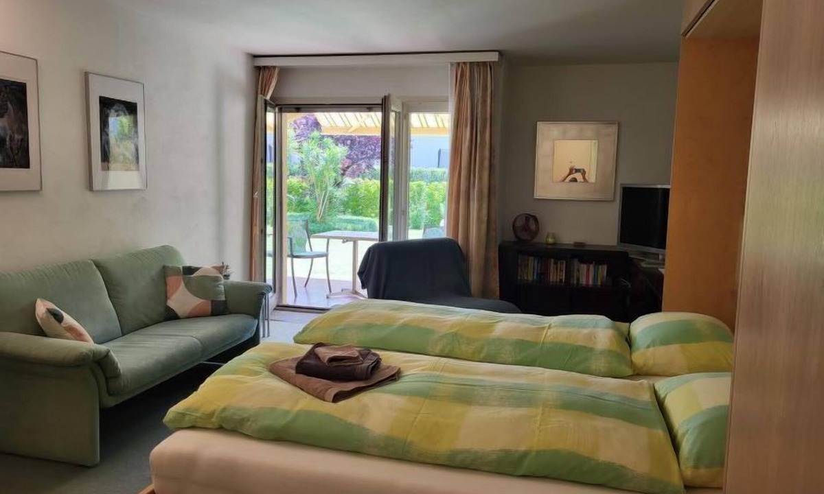 Caslano Apartment | Residenza Parcolago Apt 018 mit Garten by Interhome