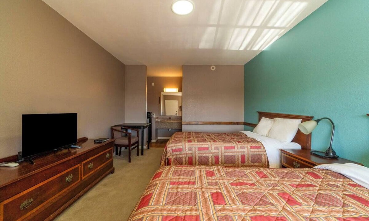 Sweet Home Hotel | Rest Easy in a Fresh, Clean Room with Quick Highway Access in Yoakum.