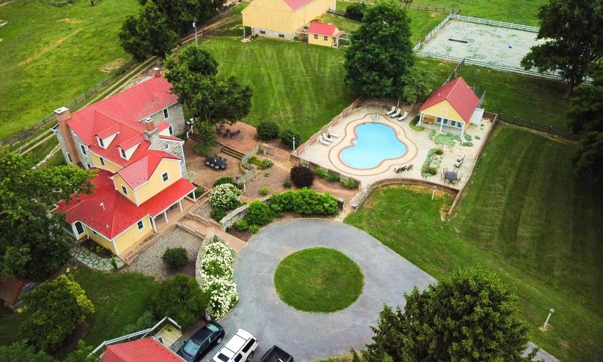 Sharpsburg House | Restored 1700s Farmhouse with Pool Overlooking Horse Pasture