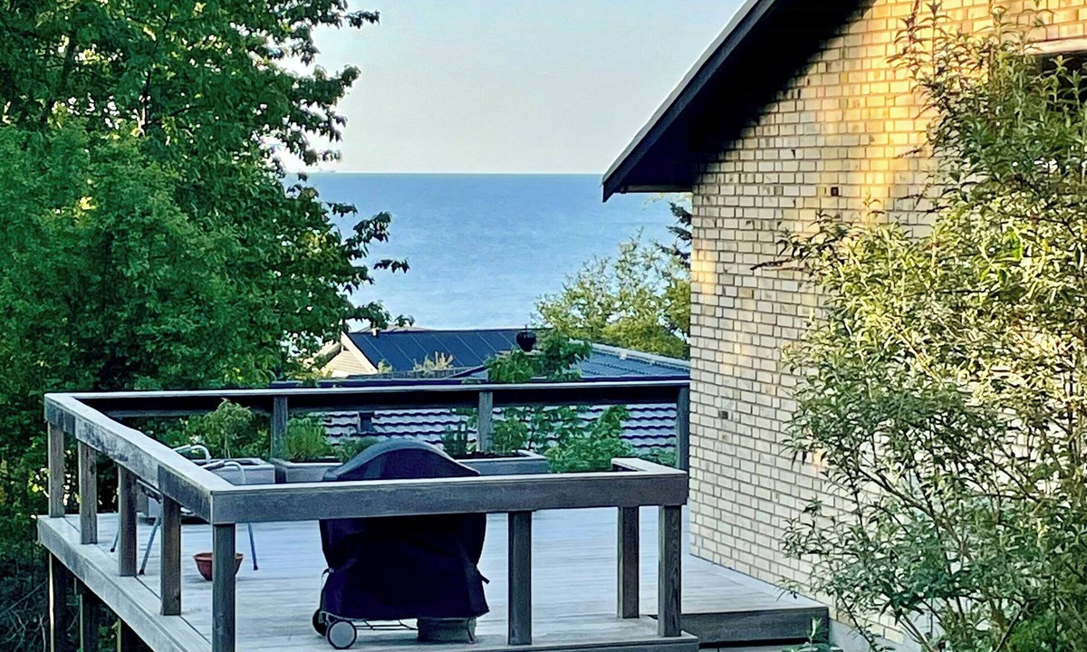 Udsholt Sand House | Retro beach house with sea view in Udsholt Strand