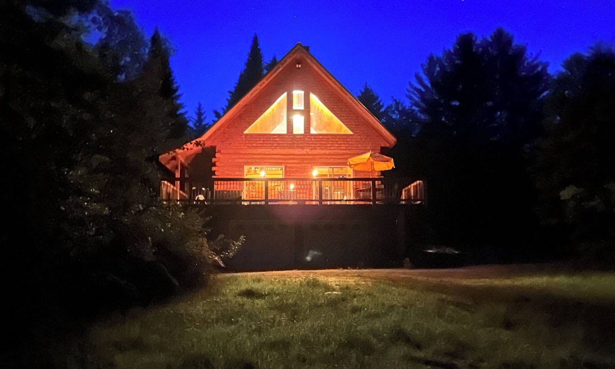 Stark Cabin | Ride right from this trailside cozy cabin in the woods with private pond.