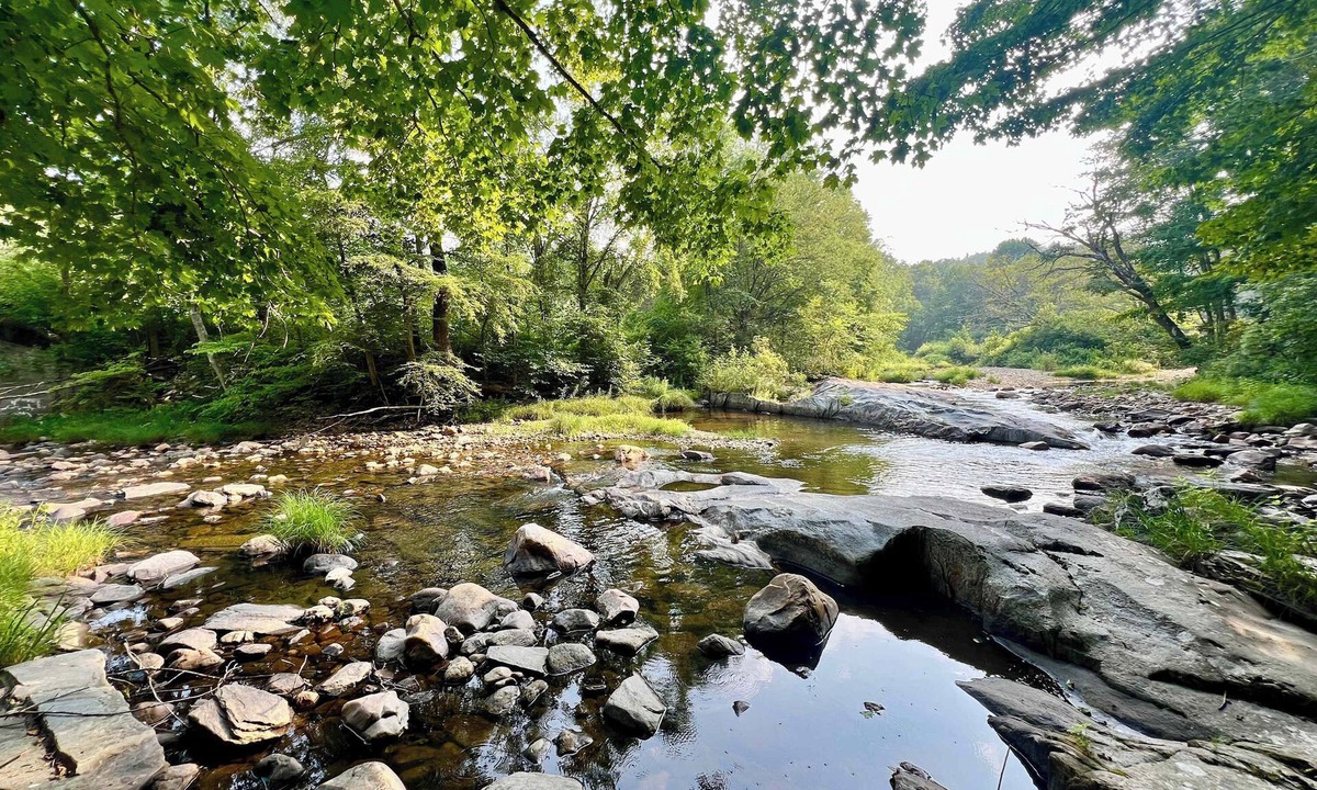 Cummington House | Riverfront Log Home on 44 Acres with Sauna
