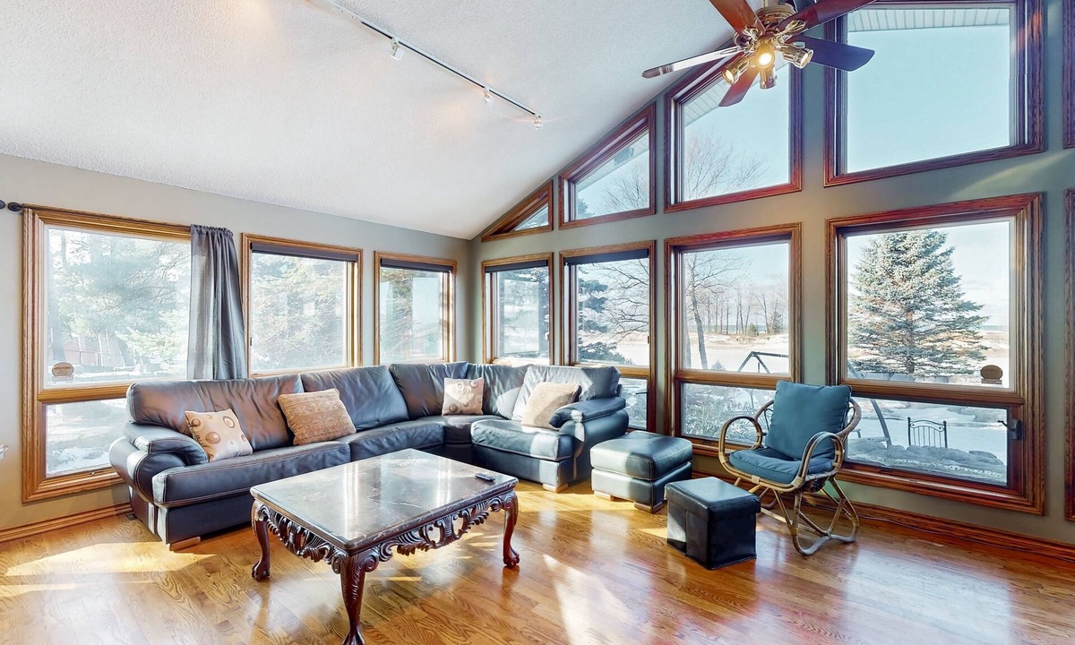 Wasaga Beach House | Riverfront retreat with seasonal heated pool, beach access, jetted tub & firepit
