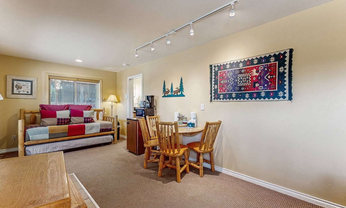 Grand Lake Condo | Riverfront retreat with a kitchenette, washer/dryer, & shared patio