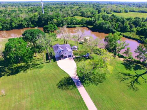 Wild Peach Village House | Riversbend Retreat on the San Bernard River