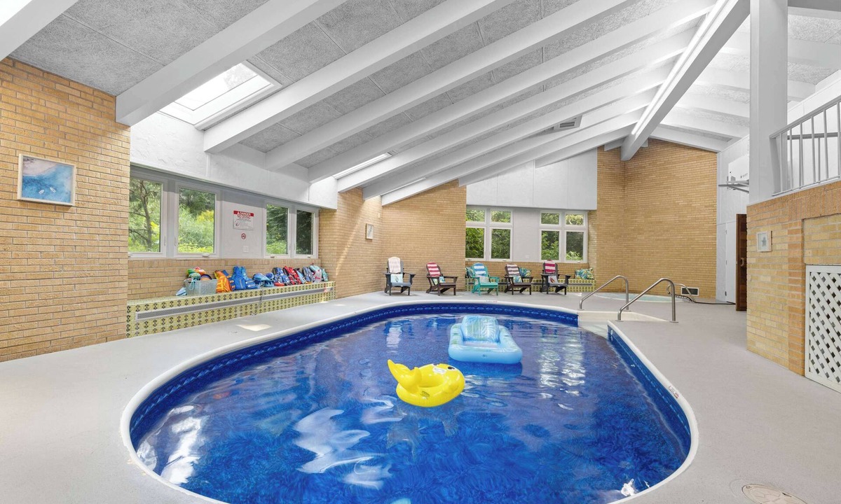 Rockford House | Rockford Retro Revival Indoor Pool + Arcade Fun!
