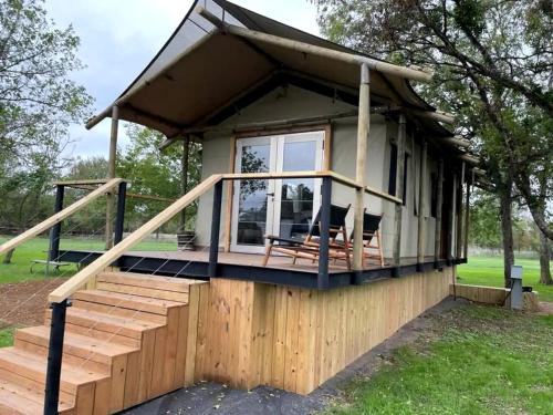 Bastrop House | Romantic Lakefront Cabin with Fire Pit near Lake Bastrop, Texas – Luxury Glamping Escape for Couples