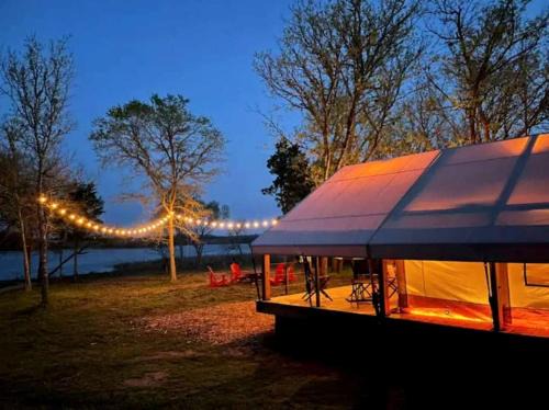 Bastrop House | Romantic Lakefront Safari Tent with Fire Pit and Peaceful Views near Bastrop, Texas