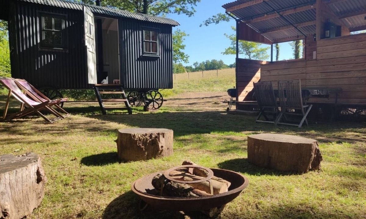 Busserolles Cabin | Romantic riverfront shepherds' hut with outdoor kitchen w/firepit