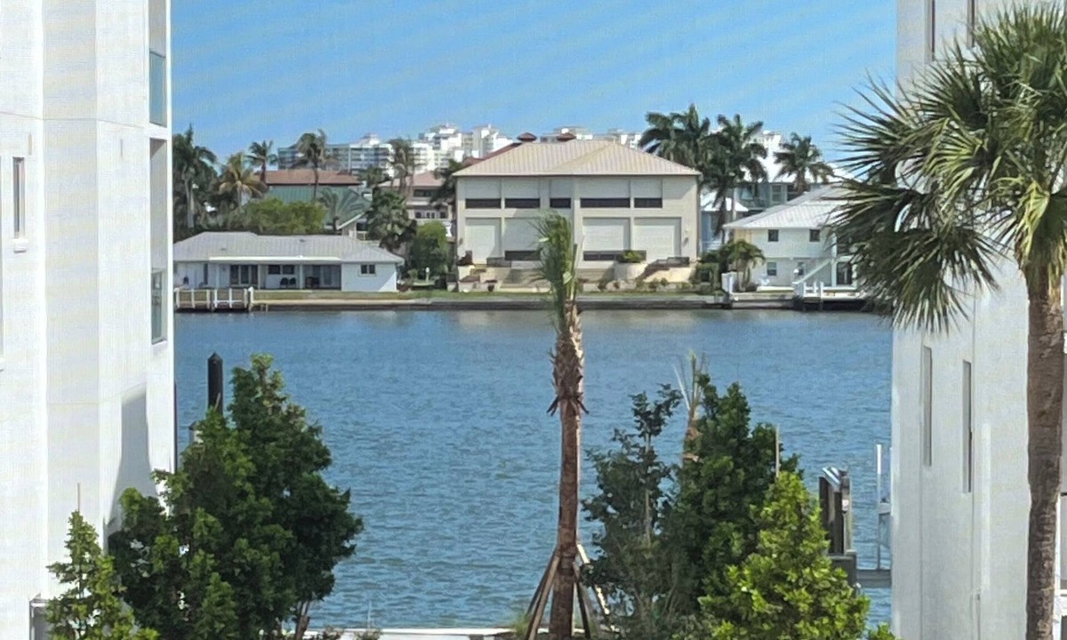 Vanderbilt Beach Condo | ROOFTOP POOL, BAY VIEW & STEPS TO VANDERBILT BEACH!