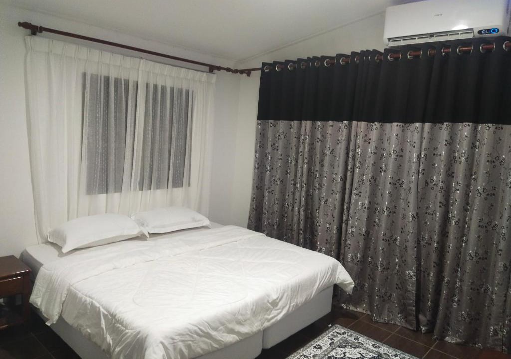 Kampung Tepoh Hotel | RoomStay Noraz