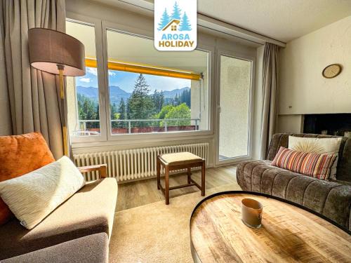 Arosa Apartment | Rothornblick 25 by Arosa Holiday