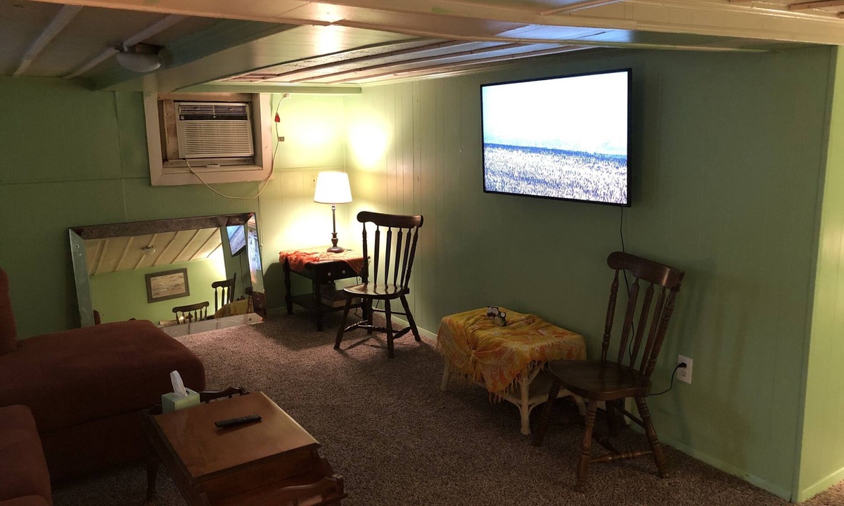 Cottage Line Apartment | Rustic BEACH FRONT Basement Apt, Pet Friendly Wi-Fi by RedAwning